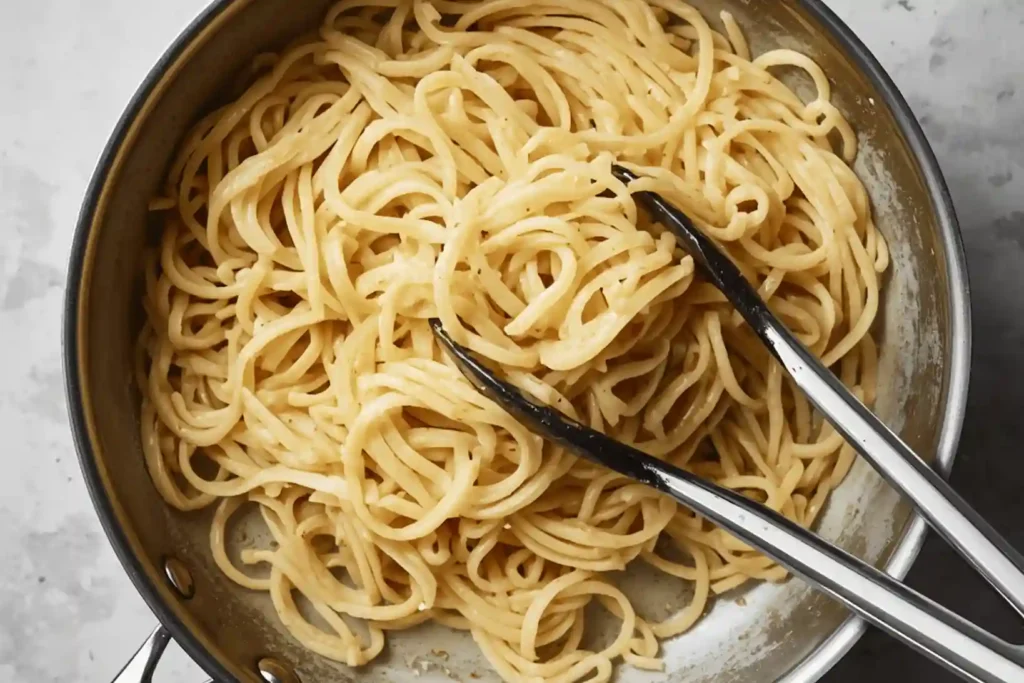 Buttered noodles coated in creamy garlic parmesan sauce
