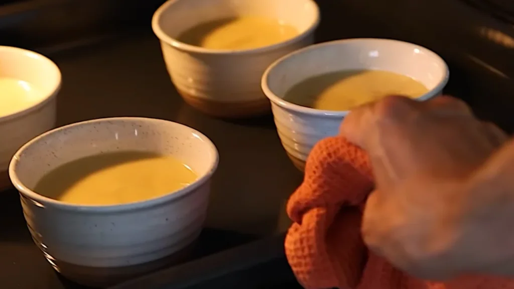 Mixing vanilla cake batter in bowls during the preparation stage of an easy dot cake recipe