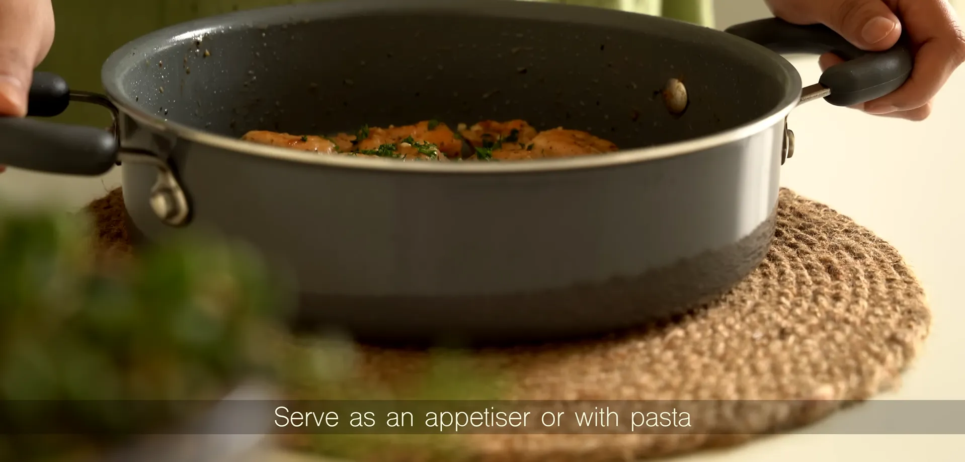 A completed easy garlic butter chicken dinner served hot in a pan, ready to be enjoyed with pasta