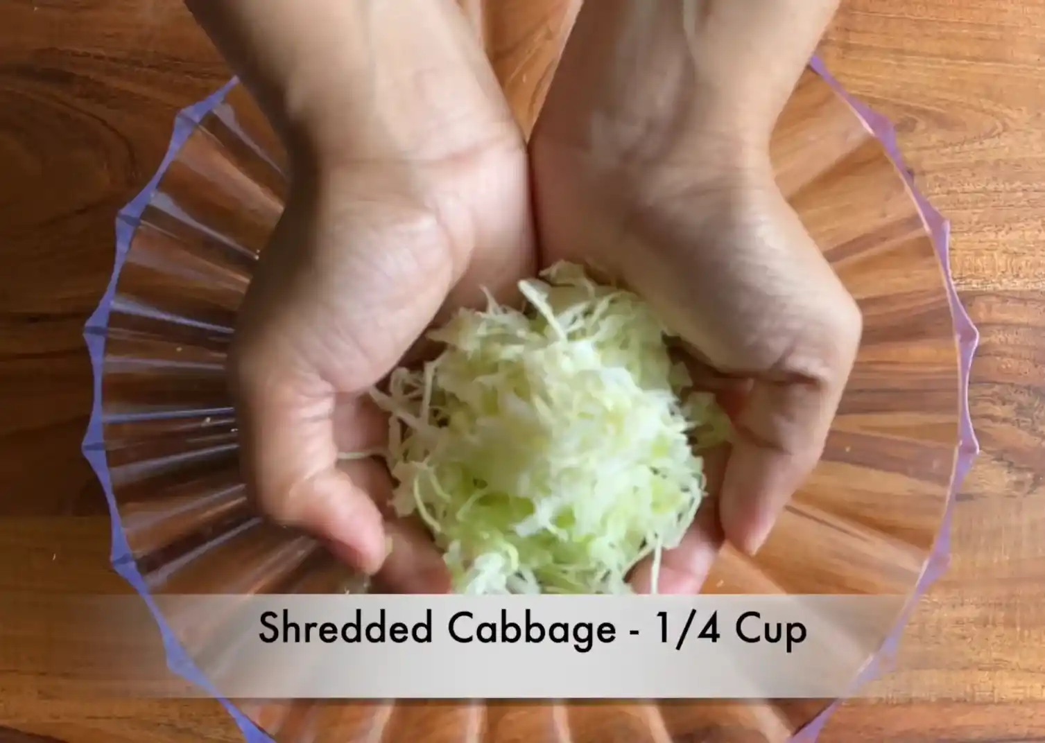 Adding 1/4 cup thinly shredded green cabbage to egg salad mixture