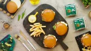 Best BBQ cheeseburger recipe with melted cheddar and shredded BBQ chicken