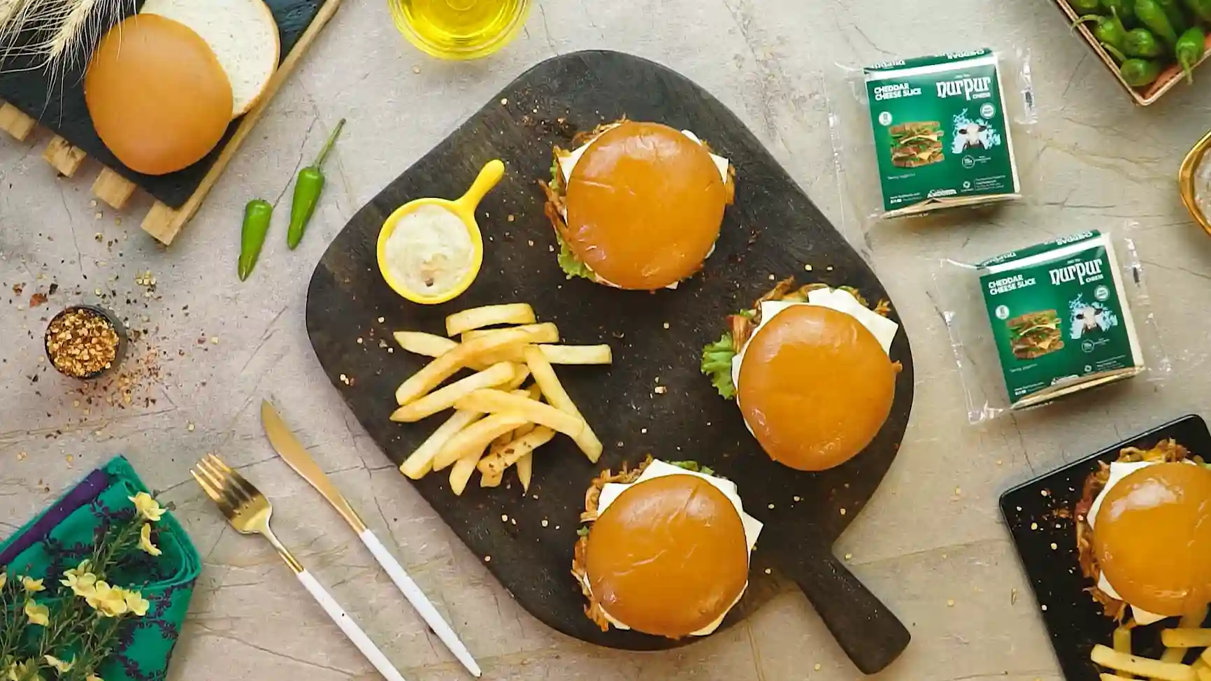 Best BBQ cheeseburger recipe with melted cheddar and shredded BBQ chicken