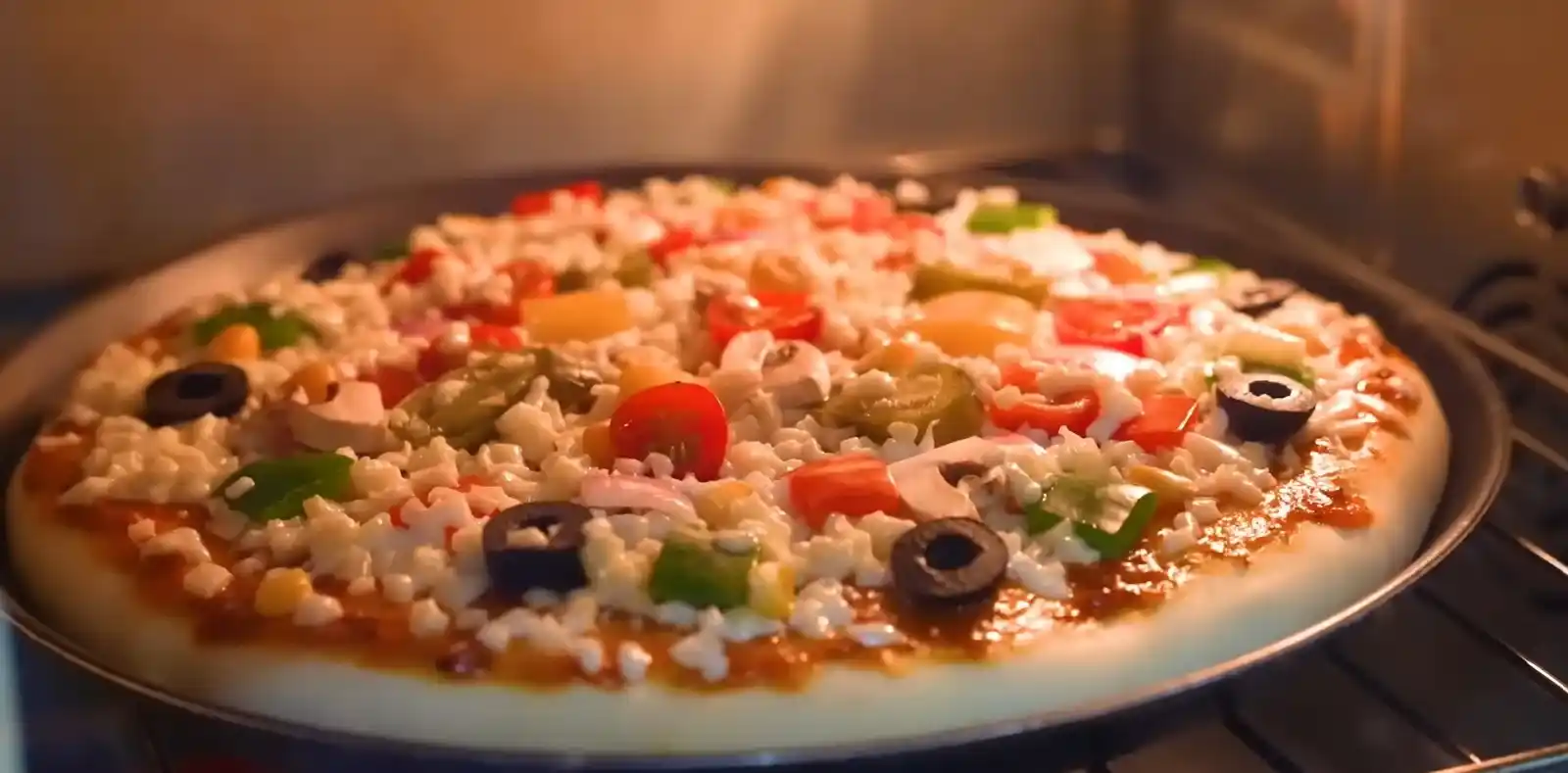 Homemade pizza cooked in oven cheese pull