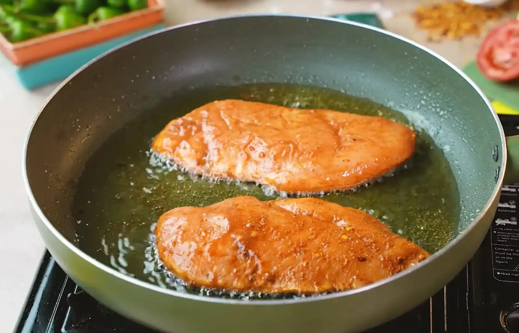 Pan searing marinated chicken breasts for BBQ cheeseburger