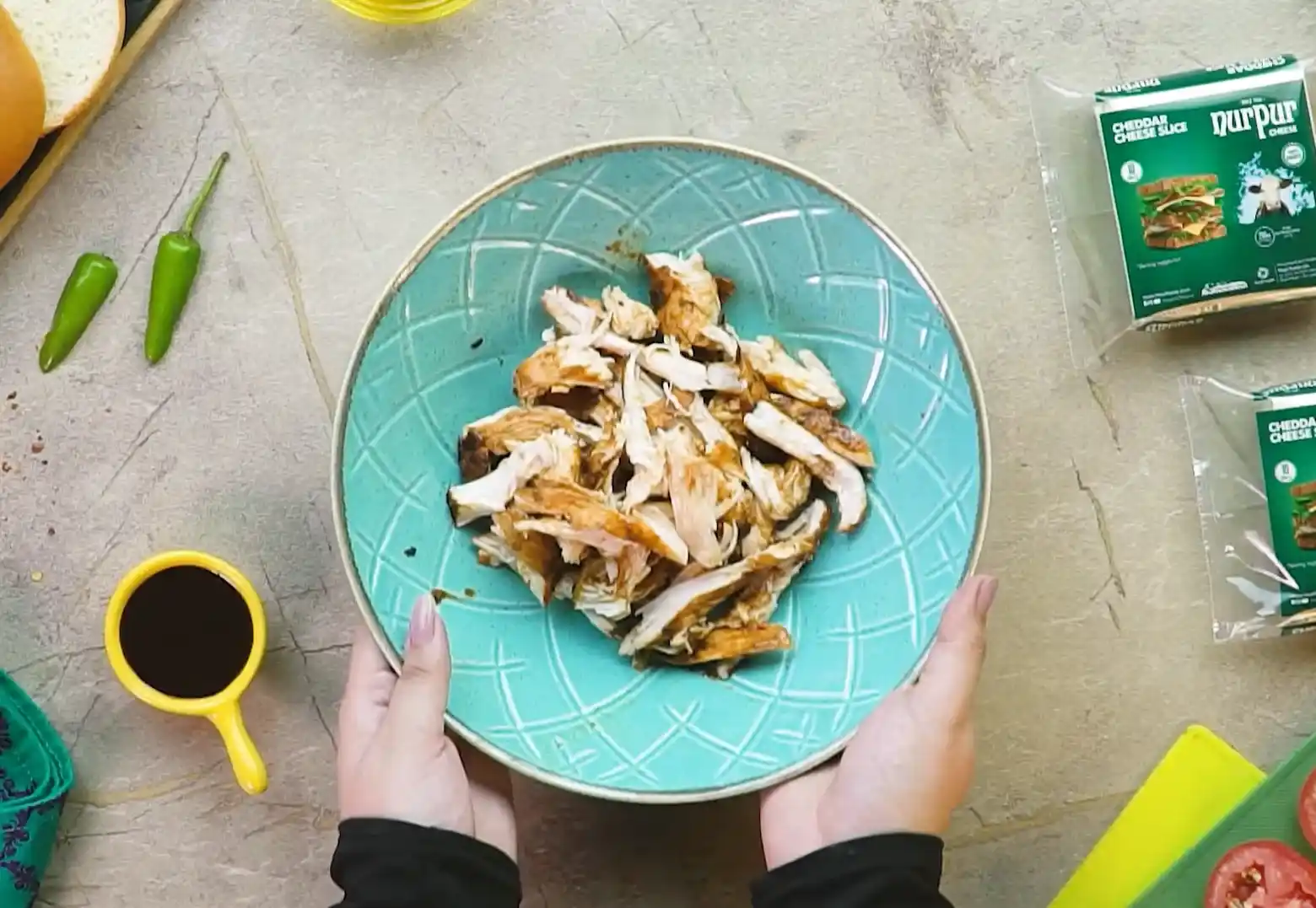 Hand shredded chicken breast for BBQ cheeseburger filling