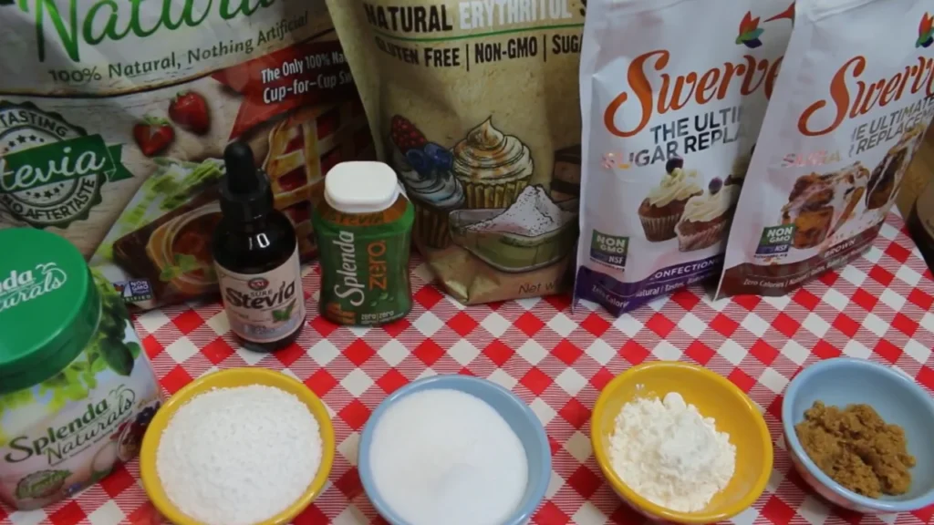 A selection of keto-friendly sugar substitutes like Swerve and monk fruit used to sweeten healthy sauces for easy low carb chicken and rice meal prep.