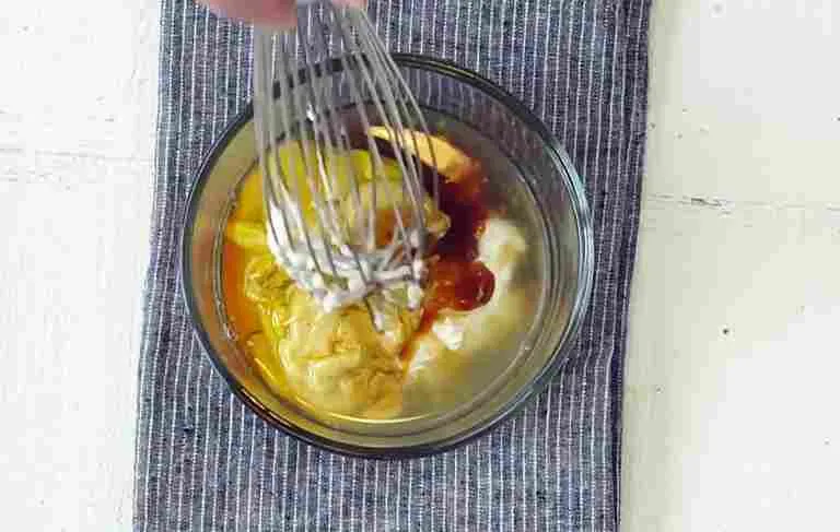 Mixing ingredients for Chick-fil-A Sauce Copycat Recipe