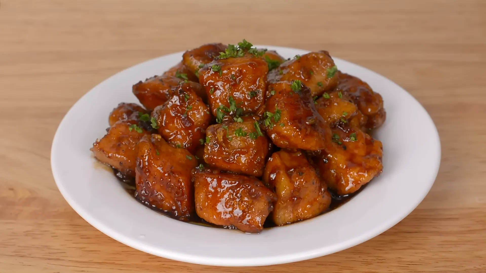 10 minute dinner recipe garlic soy glazed chicken bites on white plate 10 minute dinner recipe