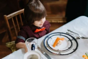 happy kids eating easy dinner ideas for picky eaters at table