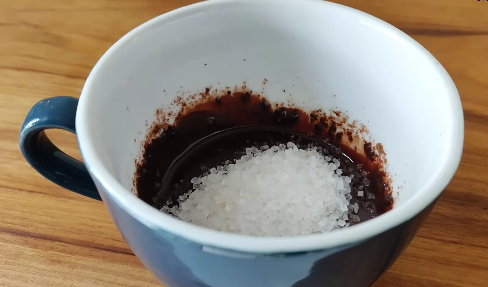 Sugar added to cocoa and oil mixture for mug cake